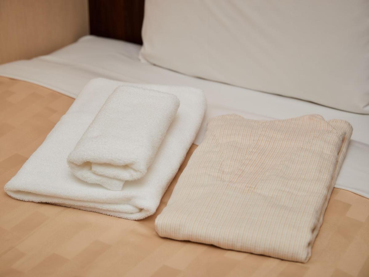 Grand Cabin Hotel Naha Oroku Extérieur photo